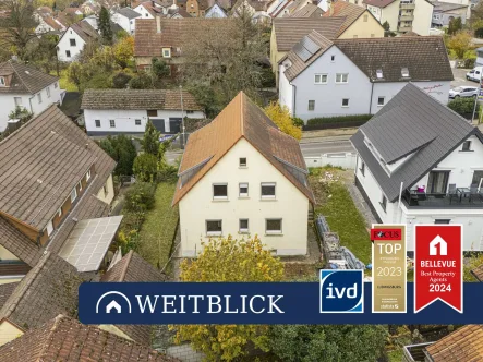 Titelbild - Haus kaufen in Lauffen am Neckar - WEITBLICK: Zweifamilienhaus mit viel Potenzial!