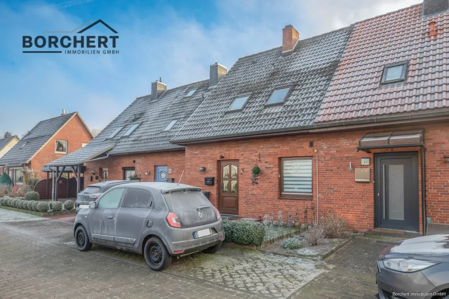 Titelbild - Haus kaufen in Kremperheide - Perfekt für die kleine Familie - Reihenhaus nahe der Bahnschienen zu verkaufen