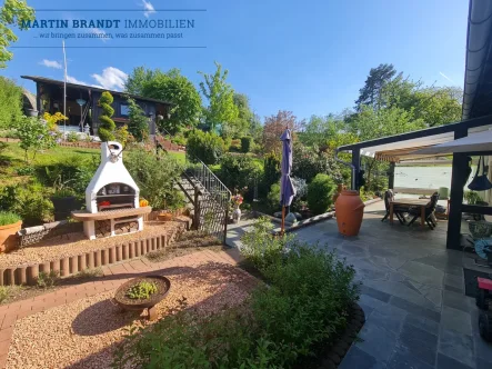 Entspannungsterrasse - Haus kaufen in Aarbergen / Panrod - Tolles Zweifamilienhaus mit traumhaften Gartenmit Platz für die ganze Familie in Aarbergen-Panrod