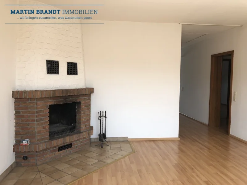 Wohnzimmer mit Kamin