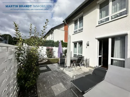 Gartenansicht des Hauses - Haus kaufen in Idstein-Wörsdorf - -R E S E R V I E R T- Attraktives Reihenhaus mit PV-Anlage und Garten in ruhiger Lage von Wörsdorf