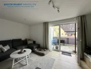 Wohnzimmer mit Ausgang Balkon