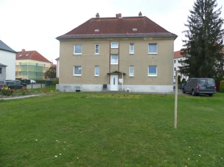 Gartenansicht - Zinshaus/Renditeobjekt kaufen in Mügeln - Charmantes Mehrfamilienhaus von 1938 mit großem Potenzial und Grundstück!