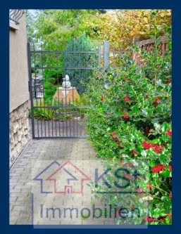 Garteneingangstor - Haus kaufen in Hohenmölsen - Eine gute Perspektive: Wohnhaus mit einem malerischen Garten in einer guten Lage von Hohenmölsen
