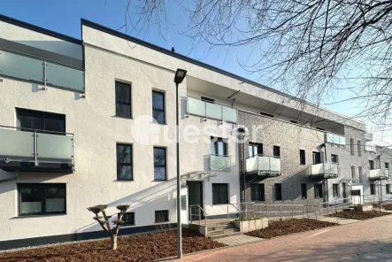 Hausansicht - Wohnung kaufen in Oberhausen - Gerade Linien - Moderner Komfort Oberhausen-Holten