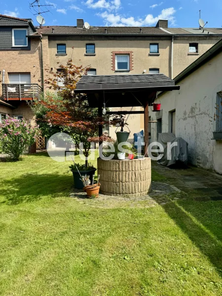 Brunnen mit Haus - Haus kaufen in Duisburg - Platz für die ganze Familie Duisburg-Neudorf-Süd