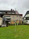 Gartenansicht mit gr. Terrasse, Balkon und Garten