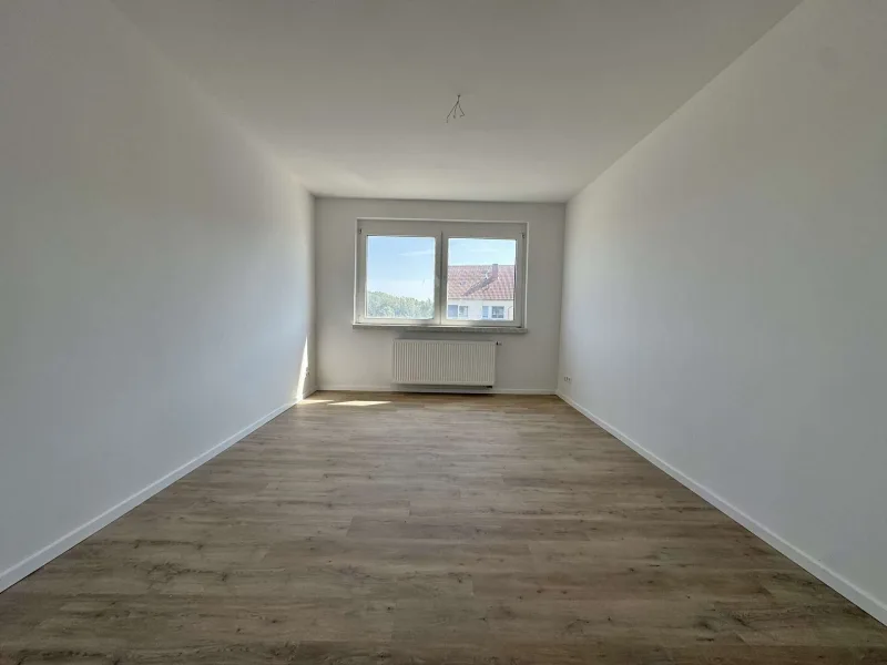 Schlafzimmer - Wohnung mieten in Völpke - Ihr neues IMMOBILIEN QUARTIER: Erstbezug nach Sanierung! 3 Zimmer Wohnung in Feldrandlage