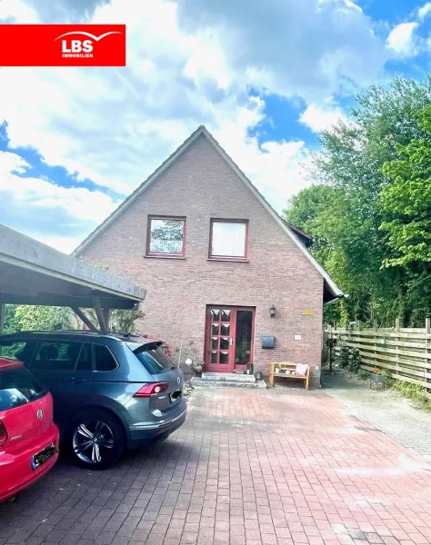 Straßenansicht - Haus kaufen in Papenburg - Einfamilienhaus 