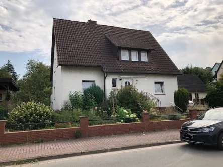 1 - Haus kaufen in Holzminden - Charmantes Wohnhaus in ruhiger Lage