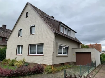 1 - Haus kaufen in Lauenförde - Hier finden Sie Ihr neues Zuhause - Zweifamilienhaus in ruhiger Lage!