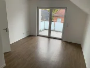 Wohnzimmer mit Balkon