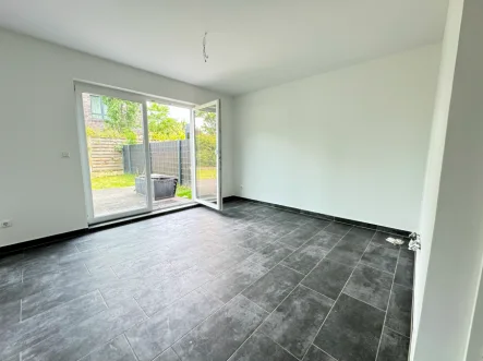 EG - Wohnbereich - Haus kaufen in Osnabrück - Moderne DHH in ruhiger Lage: Ideal für junge Familien 