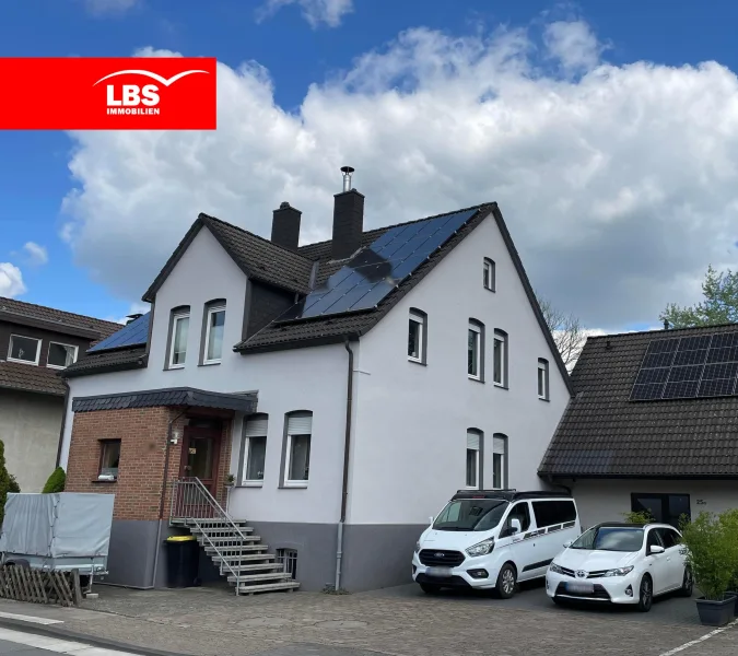 Straßenansicht Hauseingang - Haus kaufen in Herford - Gepflegtes Zweifamilienhaus in beliebter Lage von Herford