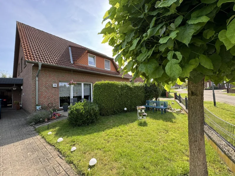 Außenansicht - Haus kaufen in Brockum - Charmantes Doppelhaus in Brockum