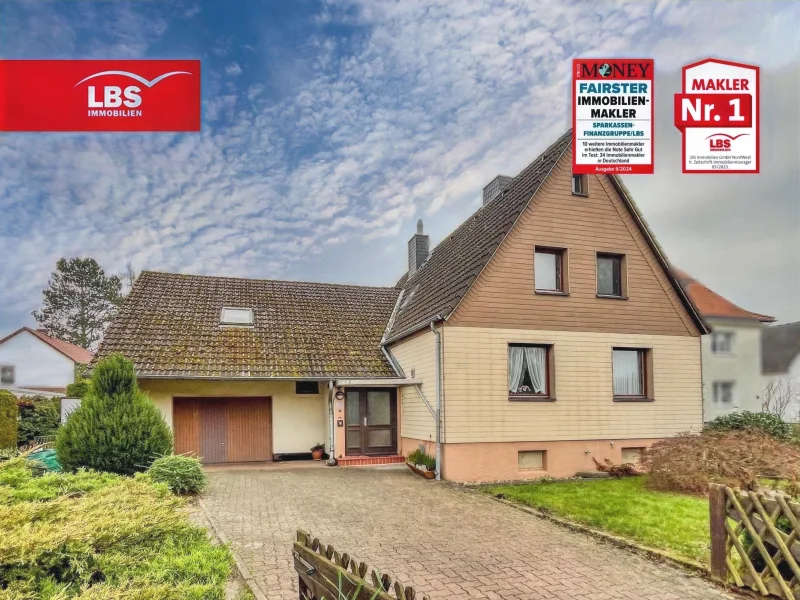 Außenansicht - Haus kaufen in Braunschweig - Einfamilienhaus mit großem Grundstück und Garage in Bestlage!