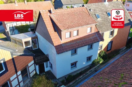 Süd-Westansicht - Haus kaufen in Langelsheim - Gut in Schuss mit pflegeleichtem Grundstück! DHH in Neuwallmoden!