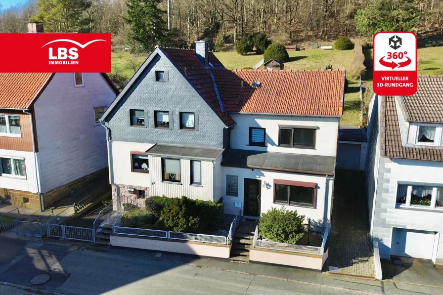 Süd-/Ostansicht - Haus kaufen in Langelsheim - Einziehen. Wohlfühlen. Modernes Zweifamilienhaus mit Charme in Wolfshagen!