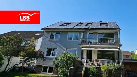 Außenansicht - Haus kaufen in Hannover - Neue Perspektiven schaffen mit diesem Mehrfamilienhaus in Döhren