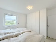 Schlafzimmer mit Einbauschrank