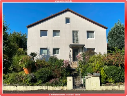 1 - Titelbild - Haus kaufen in Roßdorf - Geräumiges Zweifamilienhaus in ruhiger Lage mit vielfältigen Nutzungsmöglichkeiten, in Roßdorf