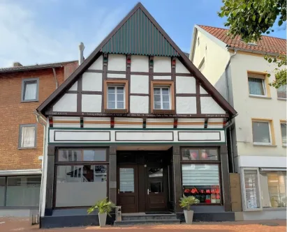 Hauptansicht - Gastgewerbe/Hotel kaufen in Westerkappeln - Historisches Fachwerkhaus mit Ladenlokal und Zimmervermietung