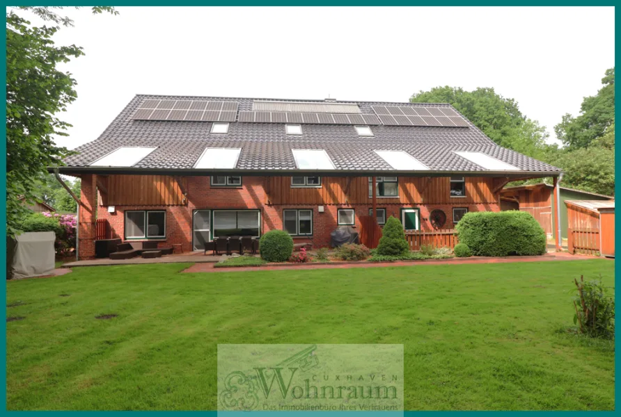 Hausansicht - Haus kaufen in Flögeln - Top-Immobilie für das Wohnen an der Nordsee mit Hund und Pferd