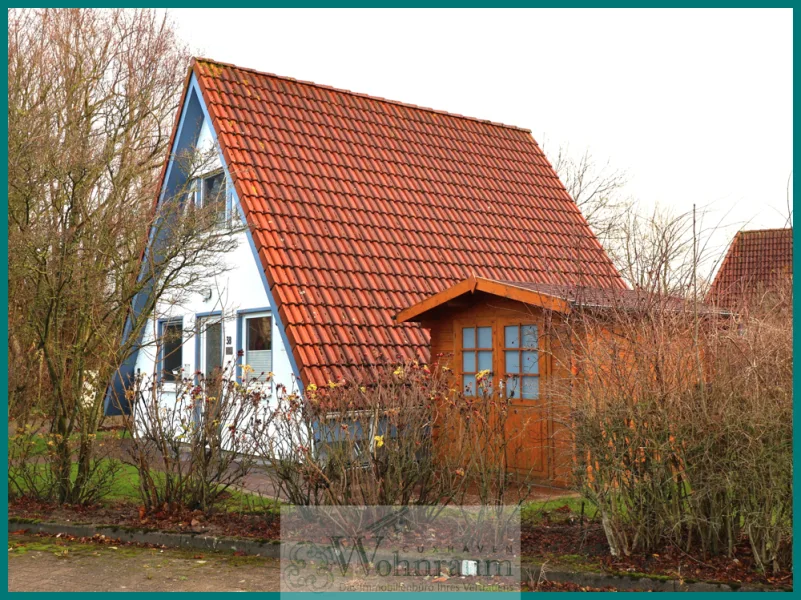 Hausansicht - Haus kaufen in Dorum - Gemütliches Ferienhaus im Ferienpark Dorum Neufeld