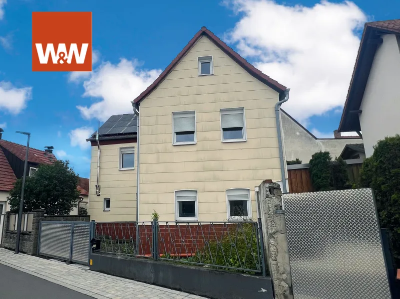 Westansicht - Haus kaufen in Sand am Main - Preisreduzierung! Modernisiertes Einfamilienhaus mit Platz für Ihre Wohnideen!