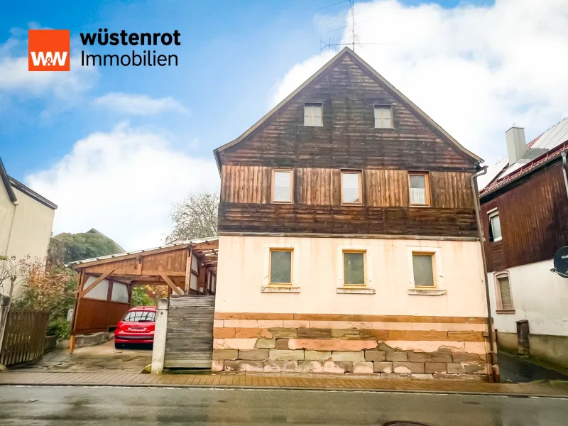 Hausansicht - Haus kaufen in Stadtlauringen / Oberlauringen - Historisches Einfamilienhaus mit Einliegerwohnung + Baugrundstück in ruhiger Lage von Oberlauringen