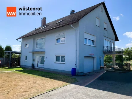 Hausansicht vorne - Haus kaufen in Bad Brückenau / Volkers - Schönes Einfamilienhaus mit viel Platz und Einliegerwohnung