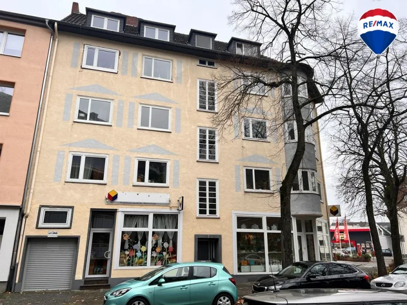 Vorderansicht Haus - Haus kaufen in Duisburg - Renoviertes Mehrfamilienhaus mit Gewerbeeinheit in Neudorf zu verkaufen !