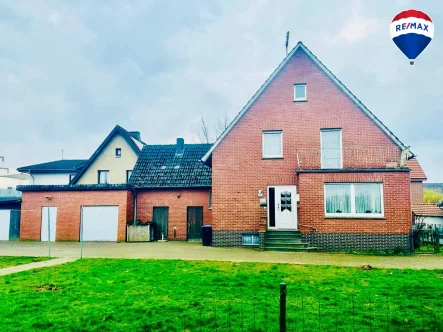 Außenansicht - Haus kaufen in Rietberg - Ein- bis Zweifamilienhaus mit riesigem Grundstück in Rietberg - Mastholte, im digitalen Angebotsverfahren