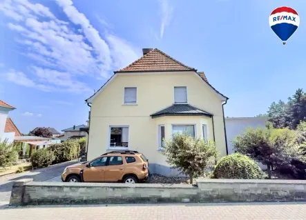 Außenansicht - Haus kaufen in Preußisch Oldendorf - Saniertes Einfamilienhaus mit großem Garten in Preußisch Oldendorf zu verkaufen!