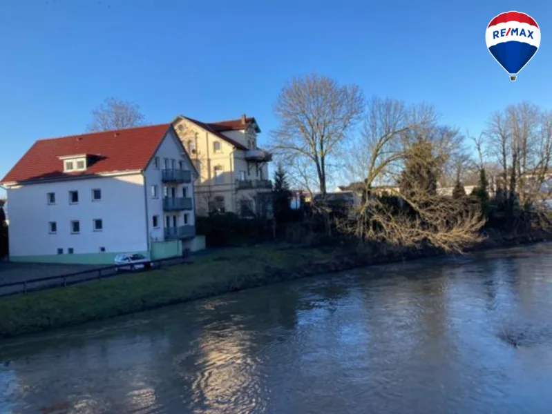 Außenansicht - Haus kaufen in Herford - Idyllisch Wohnen an der Werre: Großzügiges Mehrfamilienhaus mit zeitlosem Charme zentral in Herford!