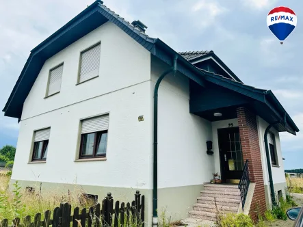 Außenansicht - Haus kaufen in Spenge - Charmantes Ein-bis Zweifamilienhaus mit großem Grundstück in Spenge