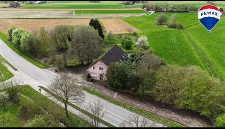  - Haus kaufen in Borgholzhausen - Vielseitiges Wohn- und Geschäftshaus mit attraktiver Grundstücksfläche zu verkaufen!