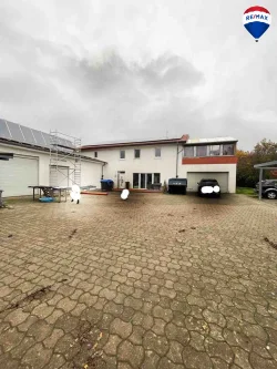  - Halle/Lager/Produktion kaufen in Rahden - Coming Soon Gewerbe- und Wohnimmobilie: Halle, Wohnung & Freifläche (481m²)