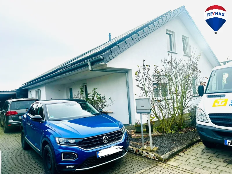 Außenansicht - Haus kaufen in Bünde - Modernes Einfamilienhaus im Bungalowstil - mit viel Platz und Komfort