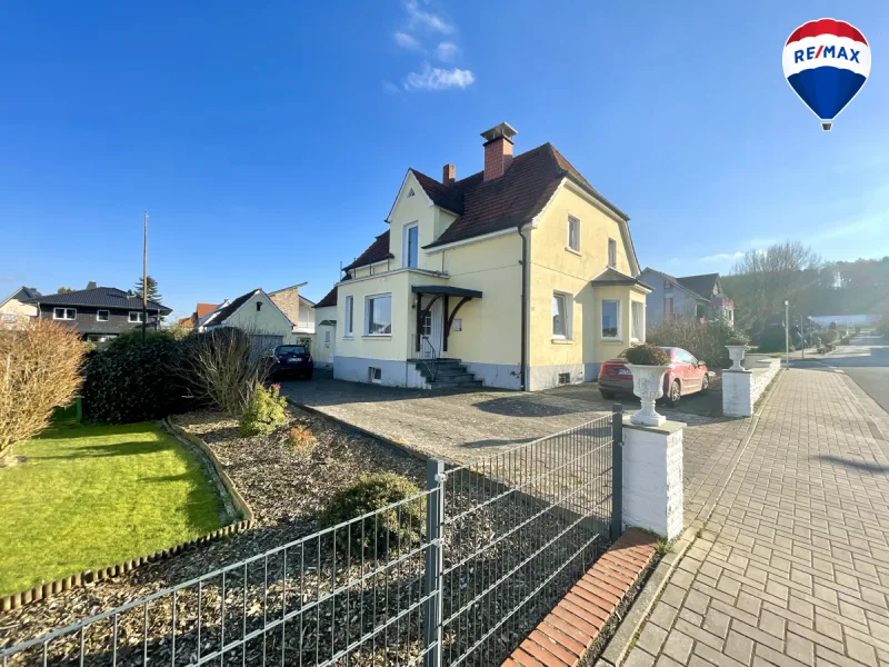 Außenansicht - Haus kaufen in Preußisch Oldendorf - Charmante Stadtvilla mit großem Garten und Gartenteich in zentraler Lage von Preußisch Oldendorf!