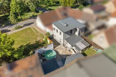 Luftbild - Haus kaufen in Westeregeln - „Charmantes Zuhause mit modernem Komfort und kleinem Garten – ideal für Familien und Paare“