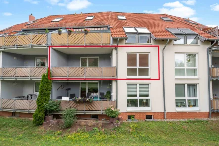 Rückansicht mit Loggia - Wohnung kaufen in Blankenburg - "Charmante Zwei-Raumwohnung mit Loggia in ruhiger Lage –  attraktives Investment in Blankenburg"