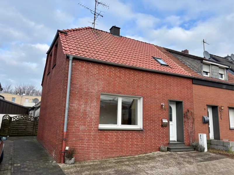 Ansicht - Haus kaufen in Coesfeld - Ideal für den Immobilieneinstieg!gepflegtes Reihenhaus