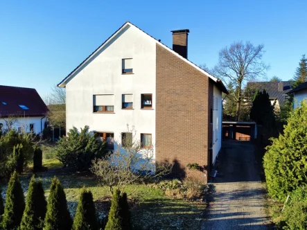 Hausansicht - Wohnung mieten in Bielefeld / Senne - Erdgeschoss-Wohnung mit Terrasse und Gartenin ruhiger Sackgasse in BI-Senne