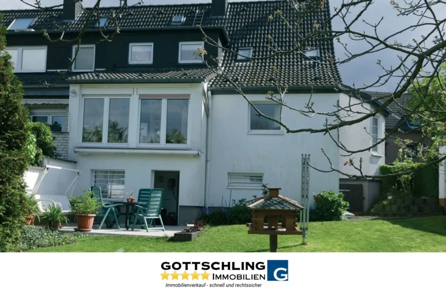Titelbild - Haus kaufen in Essen - Familienglück mit Gartenidylle in ruhiger Siedlung