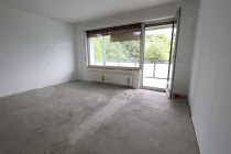 Wohnzimmer mit Balkon