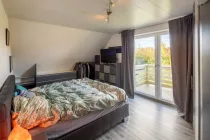 Schlafzimmer mit Balkon