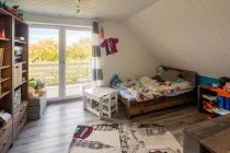 Kinderzimmer mit Balkon