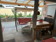  Überdachte Terrasse (Sitzecke mit Zugang zum Esszimmer)