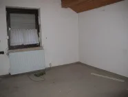 Wohnzimmer über Garage